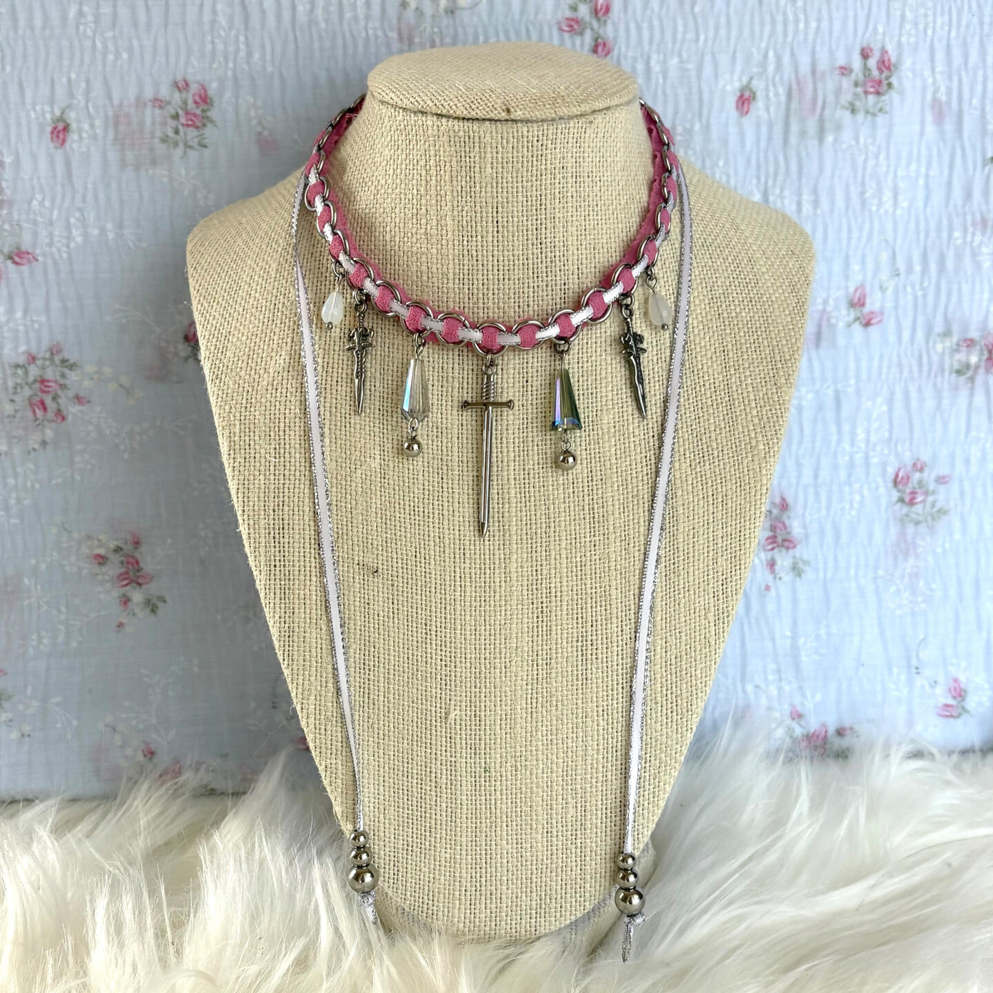 this modular choker is inspired by profane oaths, betrayal, fingers crossed behind the back. constructed using hand-dyed vintage lace, woven through stainless steel jump rings with ribbon. Hardware, beads, and charms, are stainless steel.